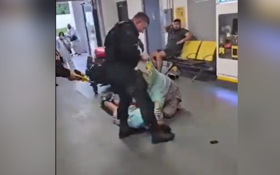 Brothers accused of assaulting police officer at Manchester Airport cleared