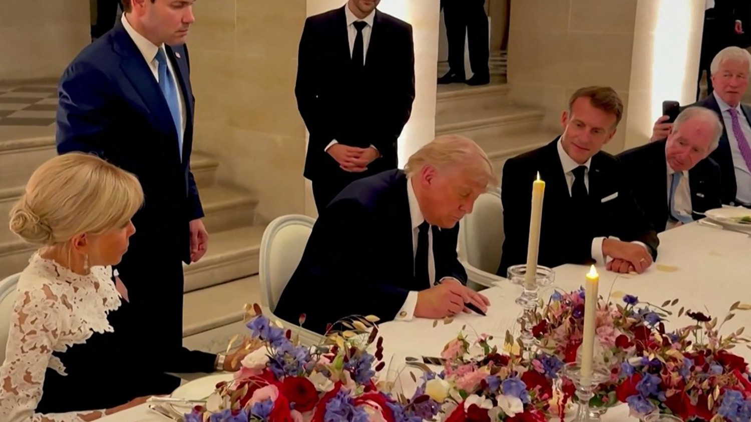 'This was not easy': Trump and Iran sign interim ceasefire deal in France